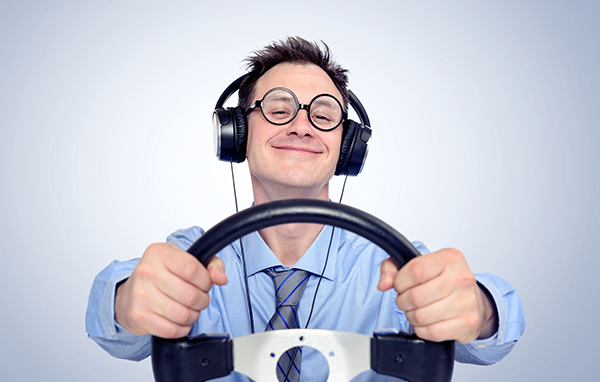 The Risks of Loud Music & Headphones While Driving | Neighborhood Tire Pros
